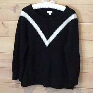 Black sweater with white v-stripe
